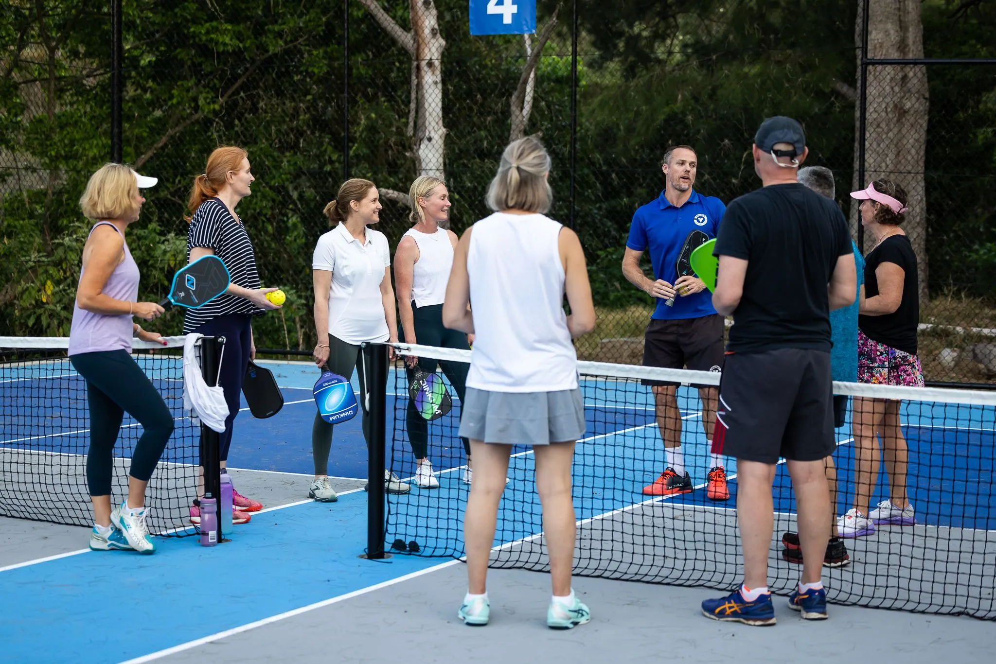 Adult tennis free trial group coaching