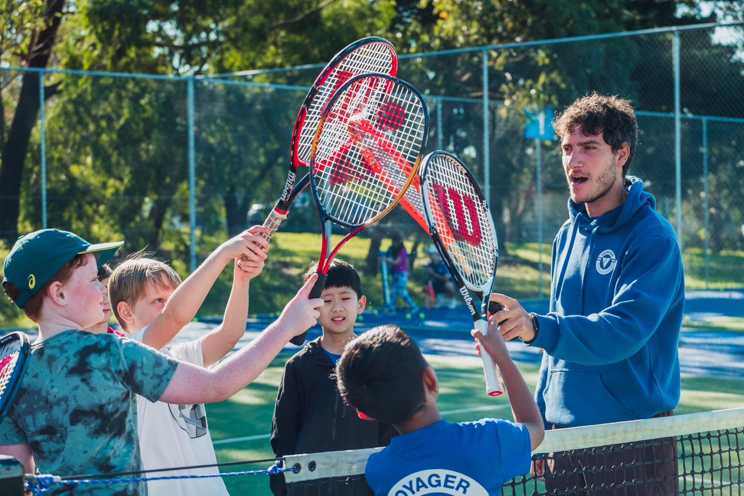 Coaches and kids enjoying their free trial program