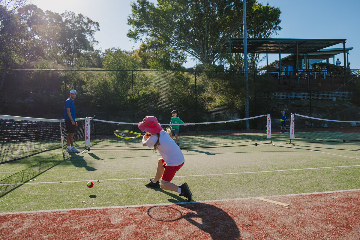 Juniors learn tennis during free trial