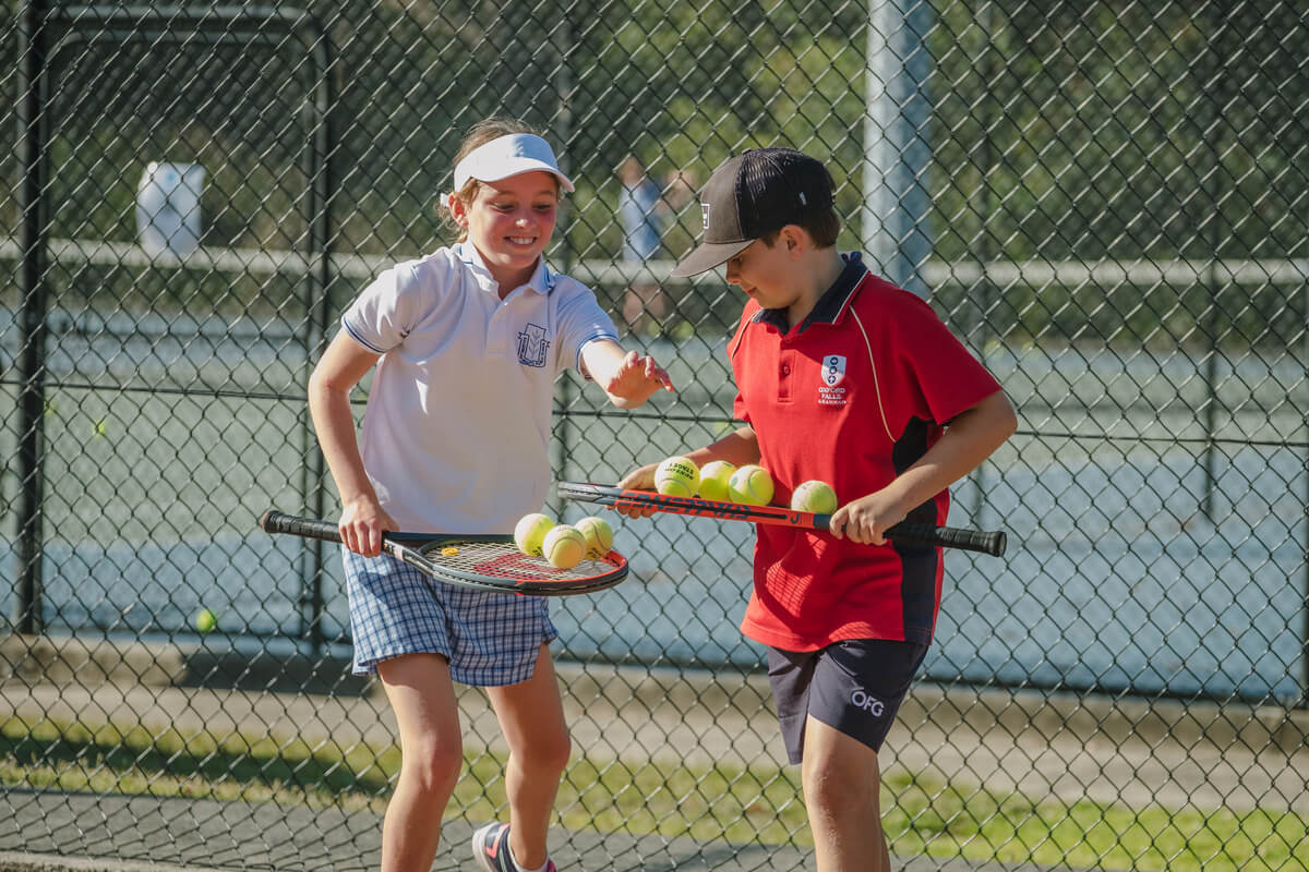 Beginners learn basic tennis drills during free trial