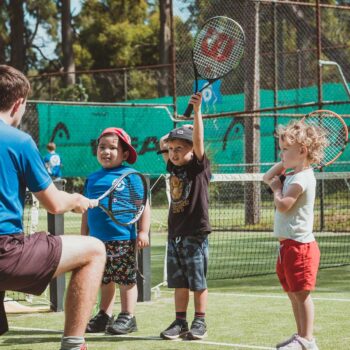 Kids enjoying the school holiday tennis camp